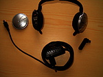 Sluchátka, baterie, mikrofon a nabíječka